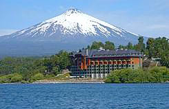 View of the hotel with the lake in the front and the volcanoe in the back